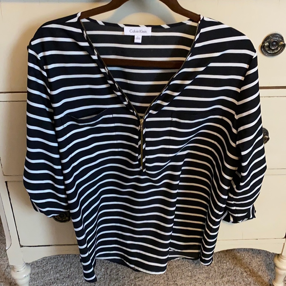 Calvin Klein blouse black and white stripes with gold details.